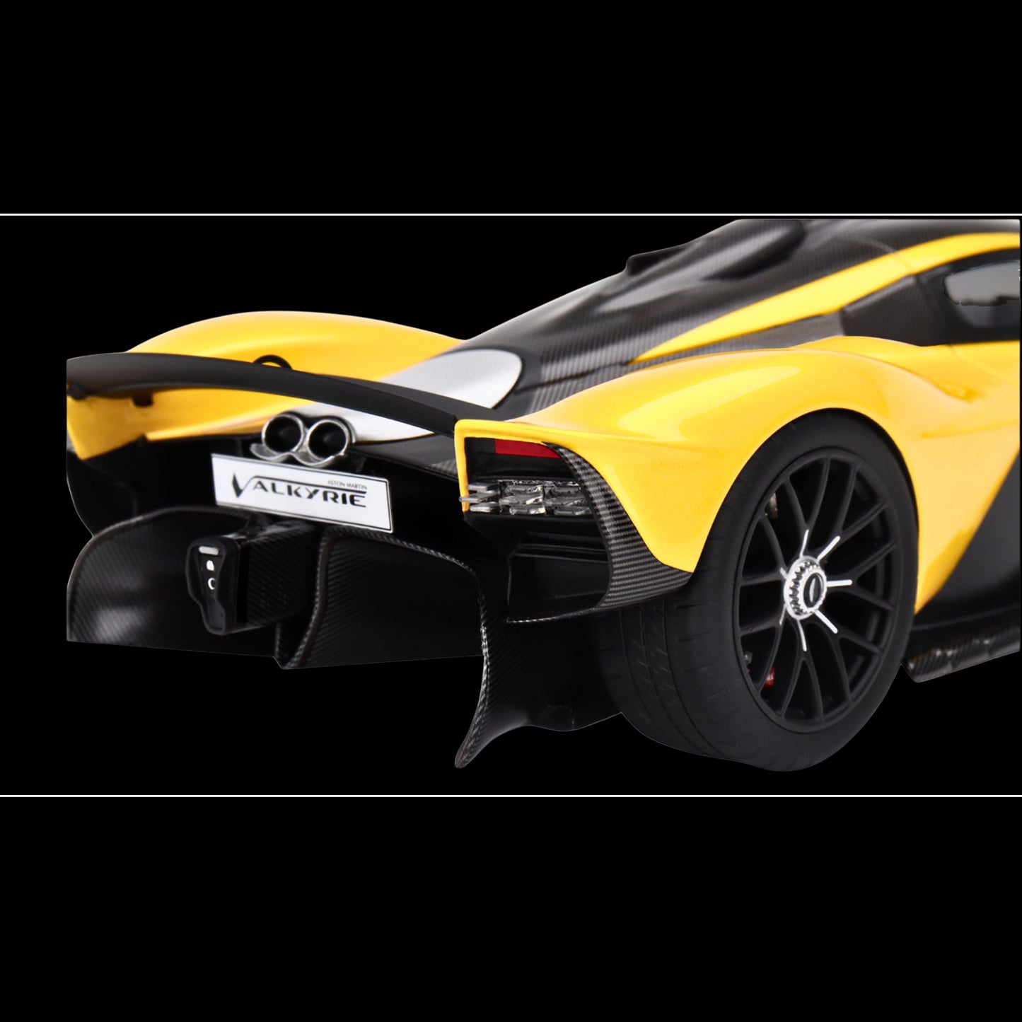 Aston Martin Valkyrie Cosmopolitan Yellow Metallic and Carbon by Top Speed